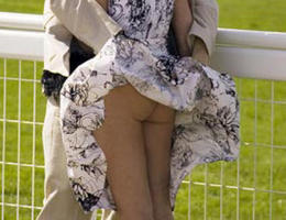 A mature woman in stockings in these upskirt shots Image 5