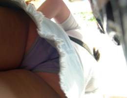A girl in white dress in this upskirt set Image 3