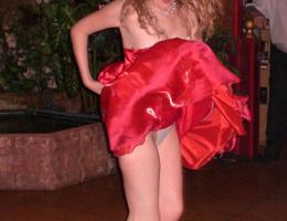 A girl in dress and panties in this outdoor upskirt gellery Image 5