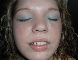 A depraved girls posing naked and taking a facial gall Image 4
