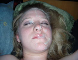 A babes giving head and taking a facial in POV style pics Image 5