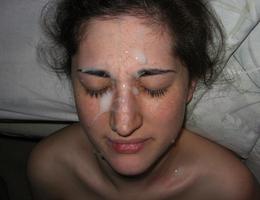 A chicks giving a blowjob and taking a facial collection Image 9