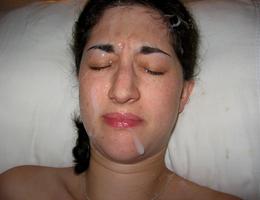 A cuties giving head and taking a facial in POV style pics Image 9