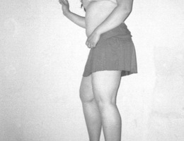 I like so much shooting this sexy a bit fat chick in stockings on camera. Image 1