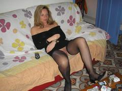 I like my hot GF exposing her pretty breasts and pink hole wearing smooth sexy stockings. Image 3