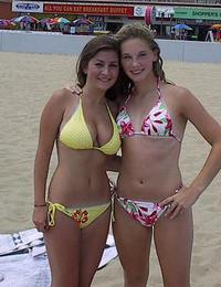 A girl stripping out of her bikini on the Rarawa Nudist Image 12
