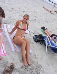 A slim and busty babe on the Massarandupio Image 1