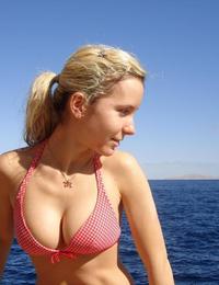 A slim and busty babe on the Massarandupio Image 6