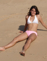 A slim and busty babe on the Massarandupio Image 9