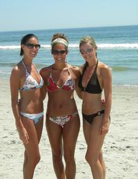 A busty bikini bitch undressing on the Bellevue Image 1