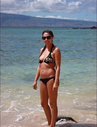 A busty bikini bitch undressing on the Bellevue Image 2