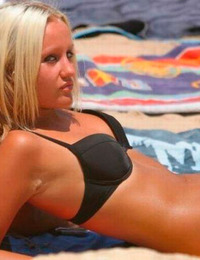 A busty bikini bitch undressing on the Bellevue Image 6