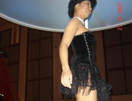 Hot ladies doing a gorgeous striptease show gal Image 1