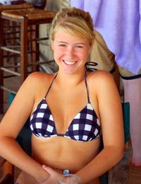 A French girl going topless at the Cancun Image 1
